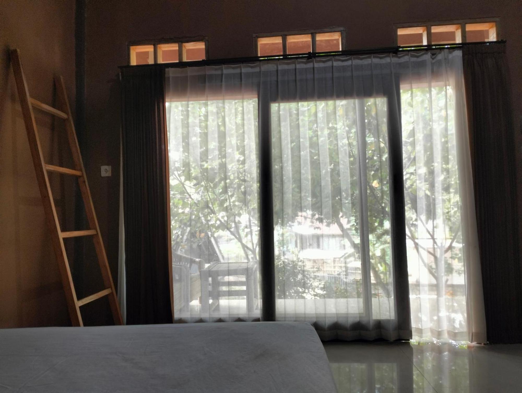Fullmoon Homestay Kuta  Exterior photo